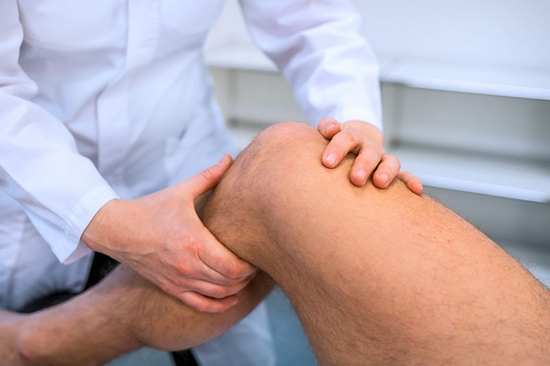 Chiropraktische Behandlung von Beinen, Knien und Füssen