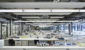 Thanks to open work spaces, research groups can interact with each other (as seen her in the wet lab) Thanks to open work spaces, research groups can interact with each other (as seen her in the wet lab)