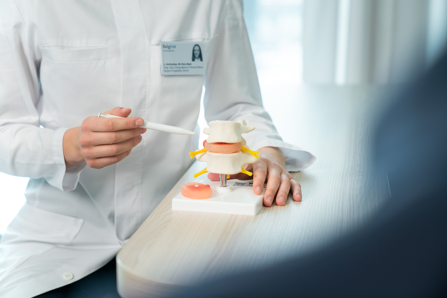 Zeigen mittels Wirbelsäulenmodell